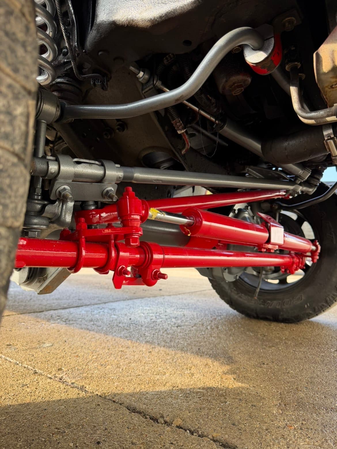 Red powder coated steering and suspension installed
